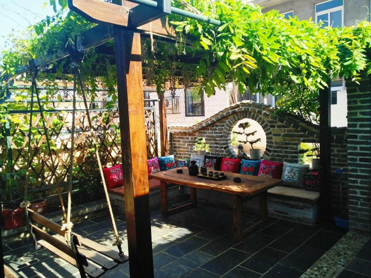 Guixu Huatang Homestay Кинхуангдао Екстериор снимка